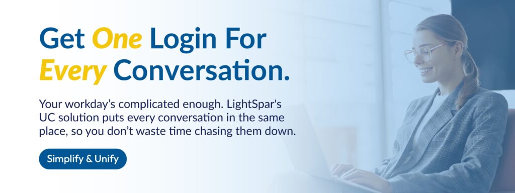 A smiling woman in glasses and a plaid blazer works on a laptop, while the banner text reads, “Get One Login For Every Conversation.” Additional text highlights LightSpar’s UC solution that centralizes communication. The image promotes the efficiency of a unified business communication platform.
